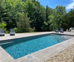 Latham Fiberglass Olympia 16 Regatta | Crystite Classic Coastal Bronze Pebble Beach inground pool